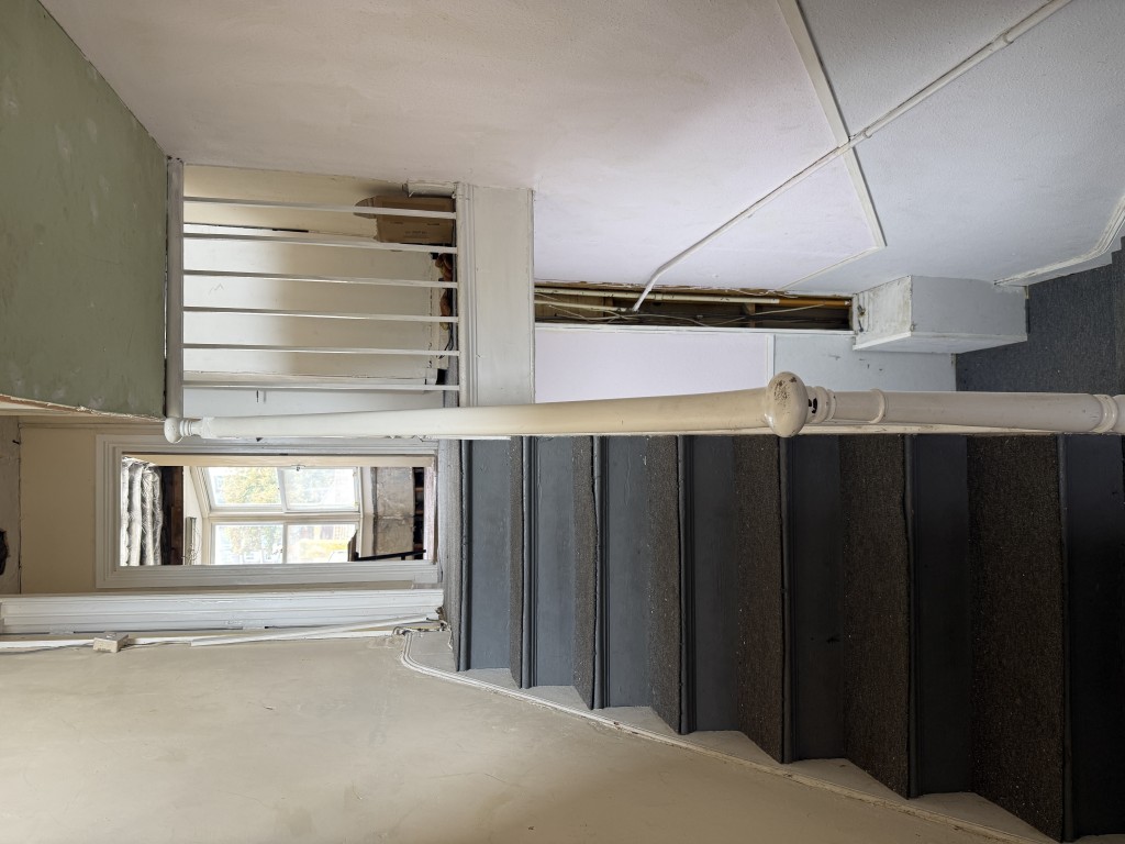Lot: 82 - MIXED RESIDENTIAL AND COMMERCIAL BUILDING WITH POTENTIAL - Hallway staircase leading to top floor